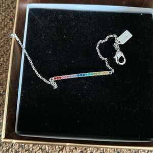 Coach silver rainbow bar bracelet with original box